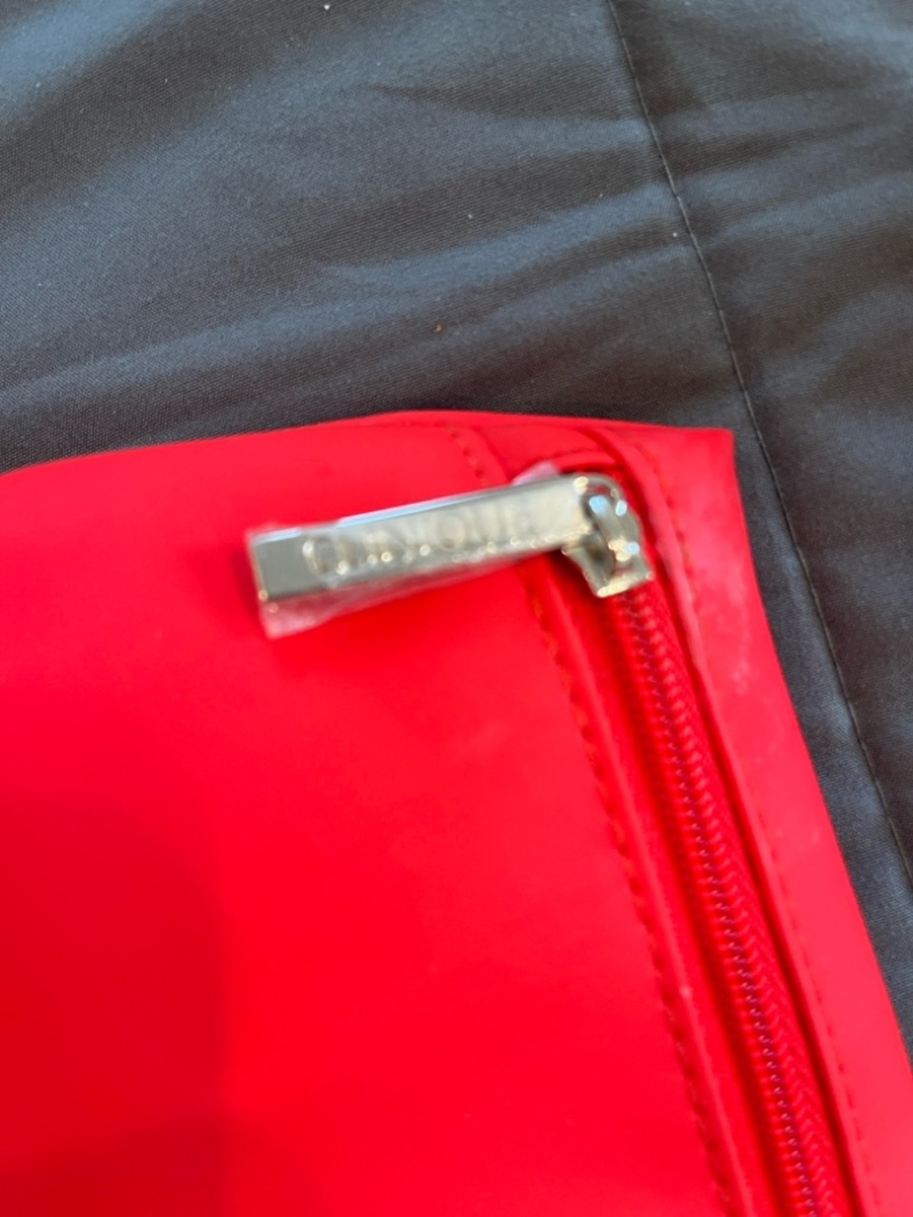 Clinique Red Cosmetic Pouch - Filled with beauty accessories. - Picture 3 of 9